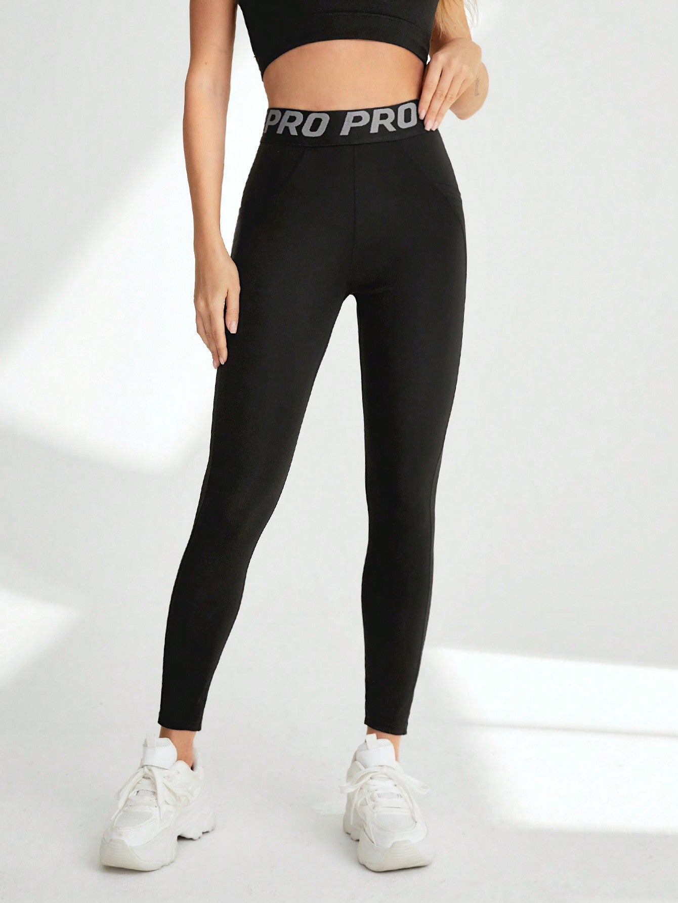 Letter Tape Drawstring Mobile Pocket Sports Leggings